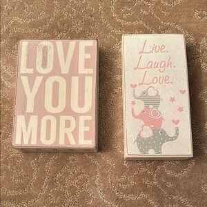 Pink and White Decorative Signs